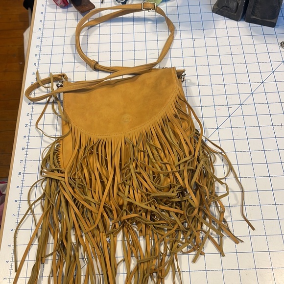 Fab And Fringe Crossbody In Tan